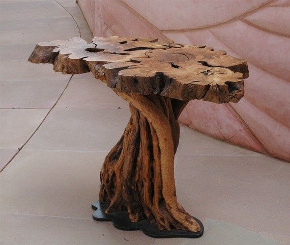 Furniture made of olive wood this table is made of branches pruned from an ancient olive tree. the wood IEQBNVW