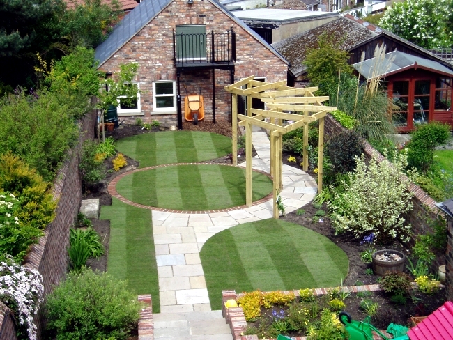 First, decide if you want to create a formal or informal atmosphere in the  garden. Informal designs follow the natural terrain and use long curves,