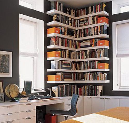 Small corner bookshelves/library. Great use of the space. This look is very  eye-catching.