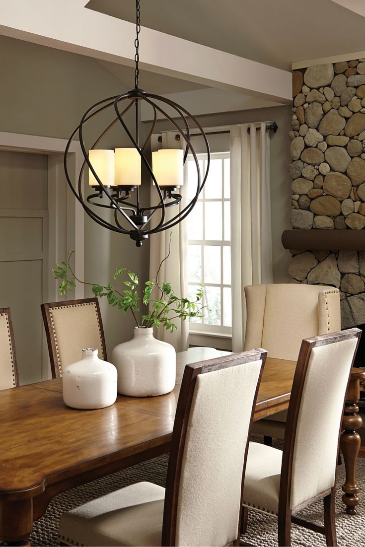 The transitional Goliad lighting collection by Sea Gull Lighting has a  sophisticated style combining divergent design elements. The rustic wrought  iron has
