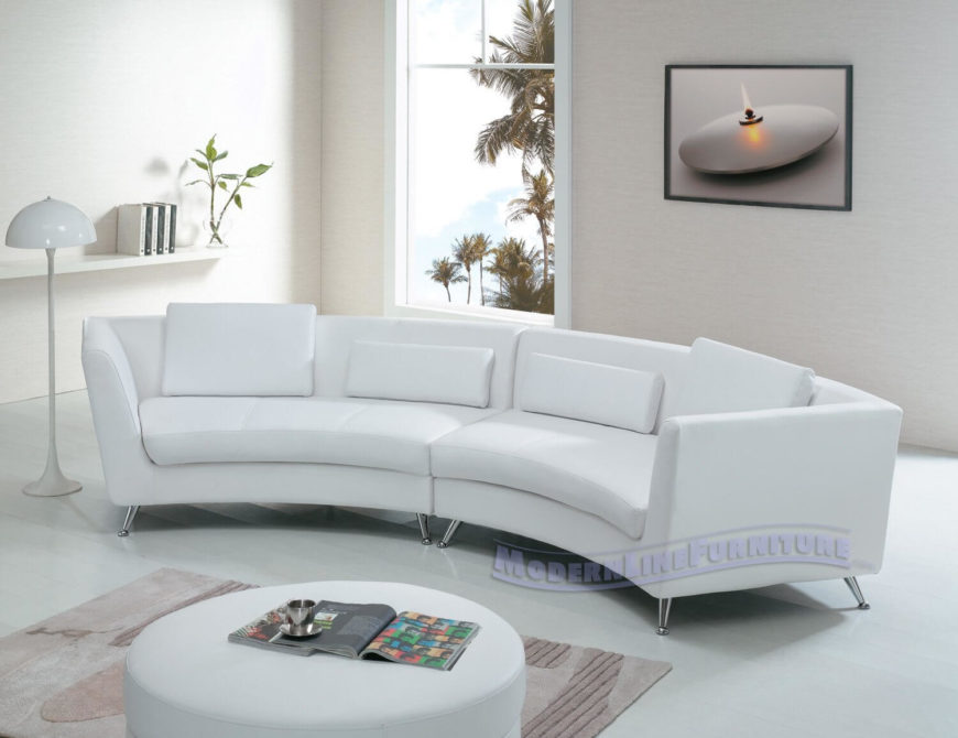 Sleek, modern design informs the look of this white leather two-piece.  Chromed .