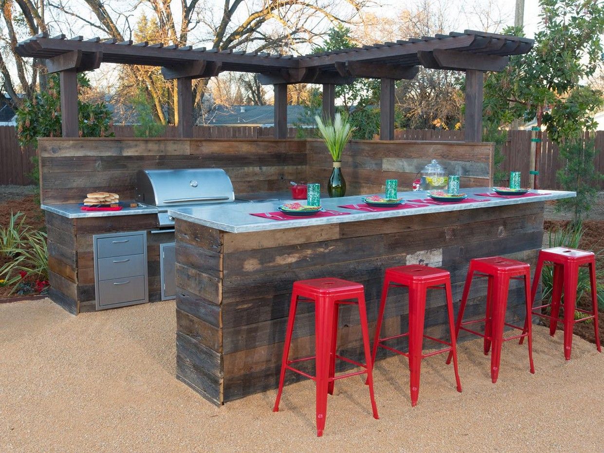 Could make a seated bar with stools separating yard from pergola/concrete  pad area