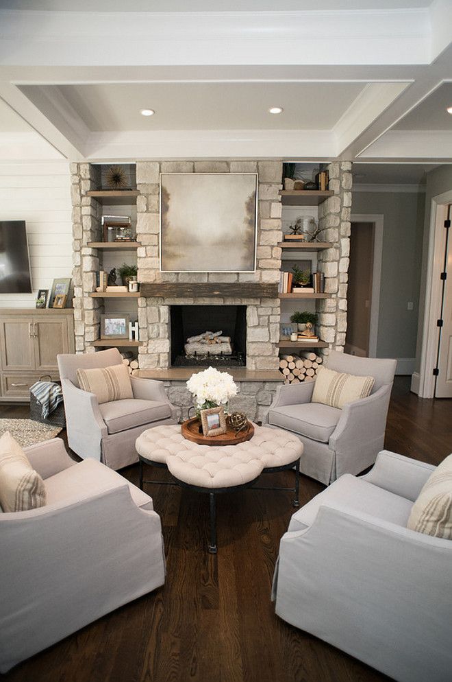 Living room Chairs. Four chairs together creates an inviting sitting area  by the fireplace. Living room chairs are Chairs are Azriel swivel glider  from Sam