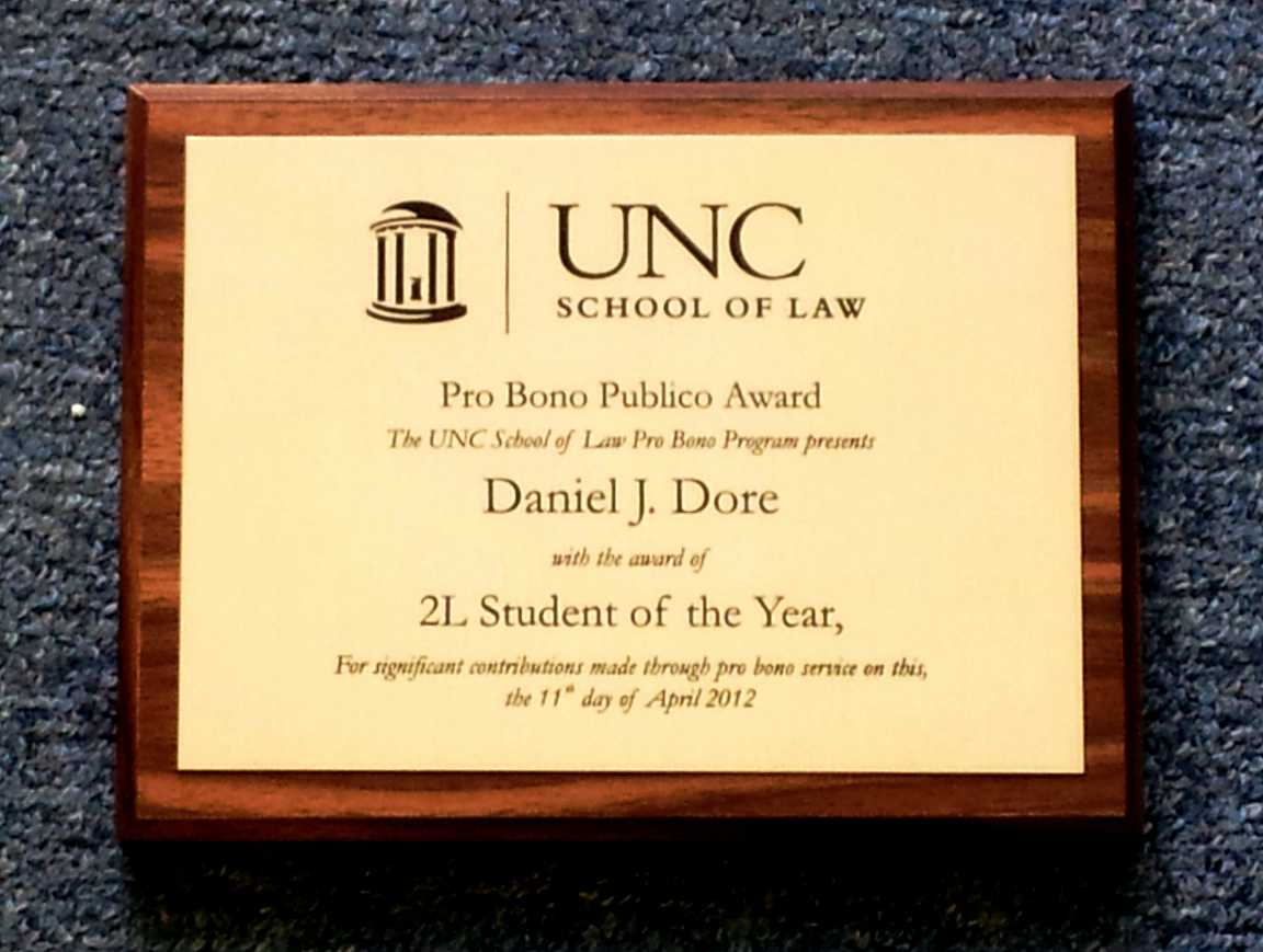 wall plaque brushed brass UNC Pro Bono