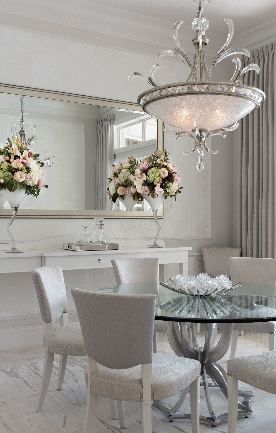 Glamorous dining room with chandeliers for the dining room
