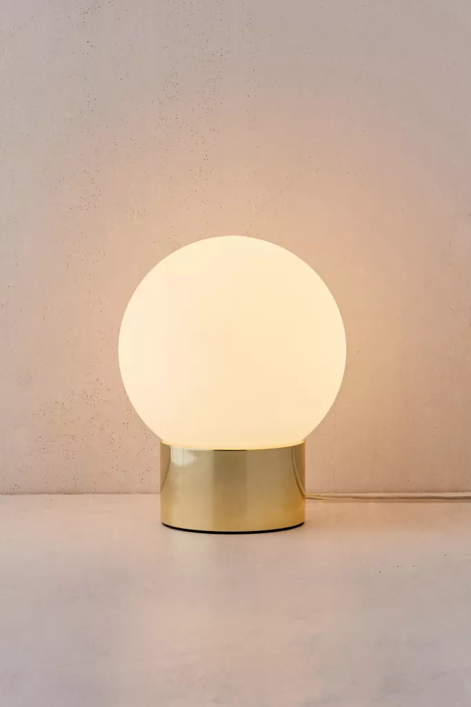 Buy a Globe table lamp for a touch of elegance in any room