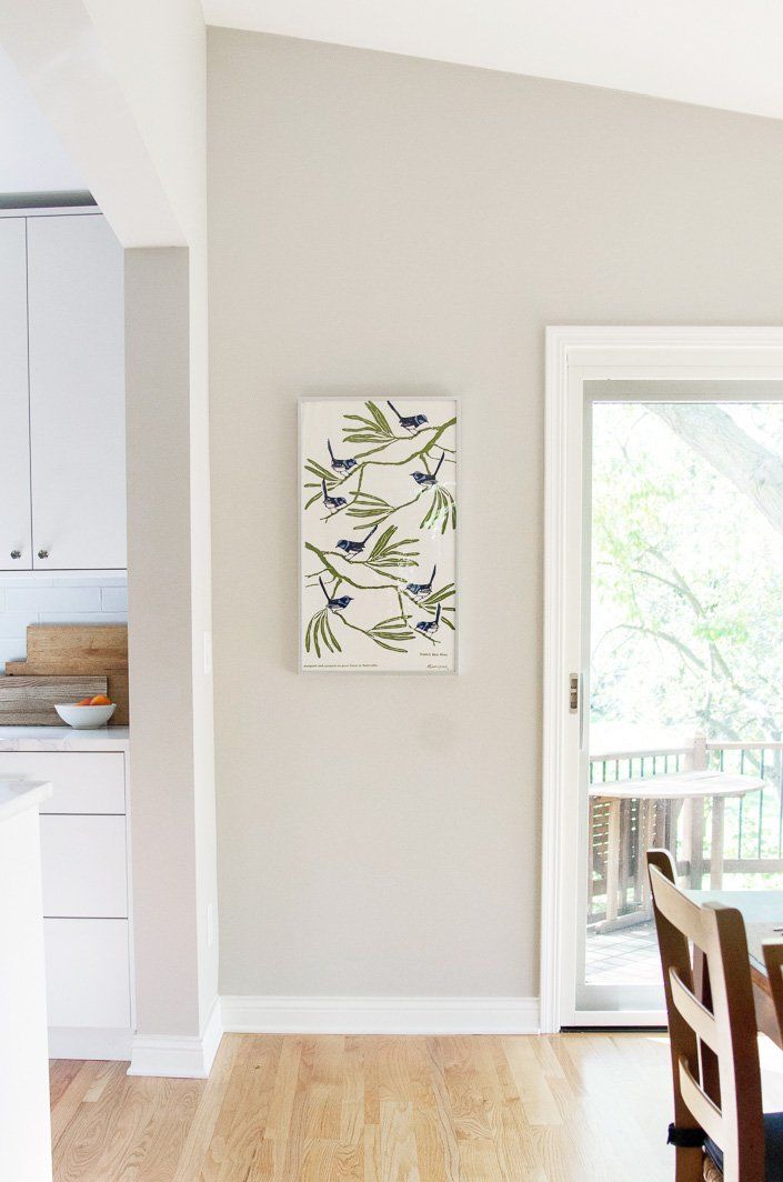 Colored walls in the kitchen bring a pop of personality