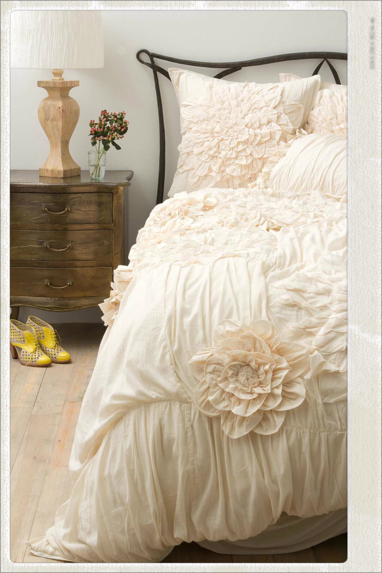 Cream colored beds add a touch of elegance to any bedroom