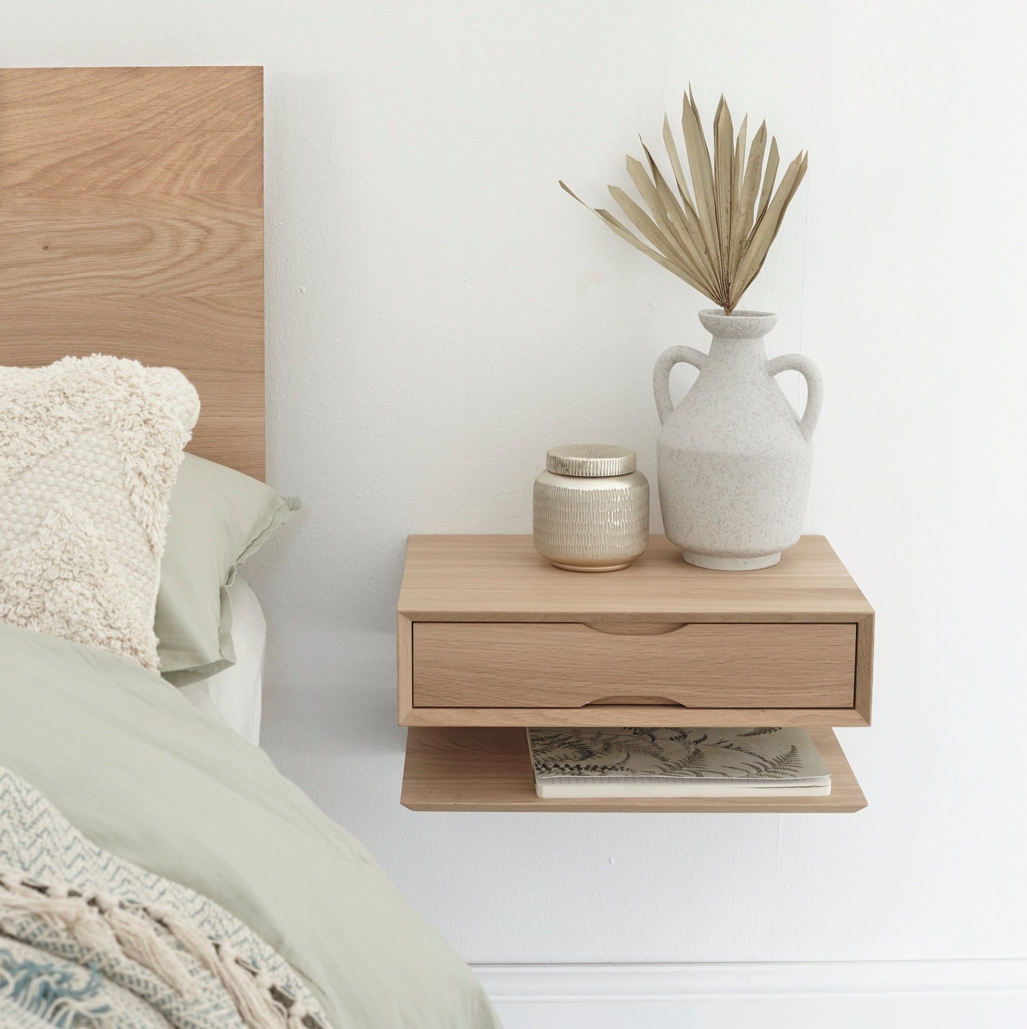 Floating bedside tables Sleek and Modern Bedside Storage Solution for Small Spaces