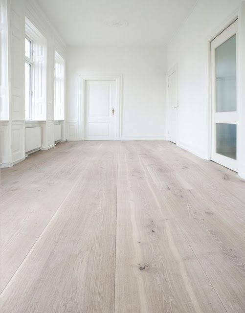 Kitchen with wooden floor Beautiful wooden floor in the kitchen adds warmth and charm to your home