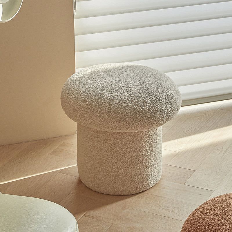 Pouf Ottoman Different names of small versatile seating piece.