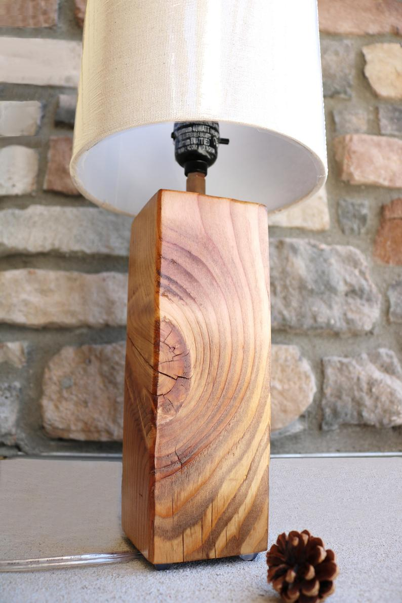 Rustic table lamp Rustic Charm Illuminated with a Cabin-Style Light Fixture