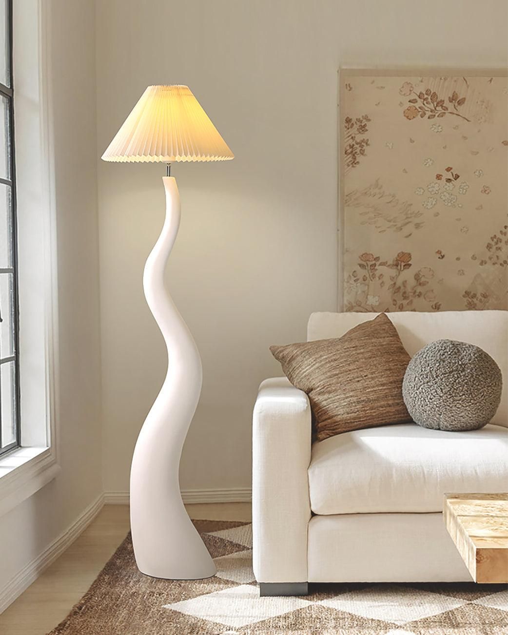 White floor lamp adds a touch of modern elegance to any room