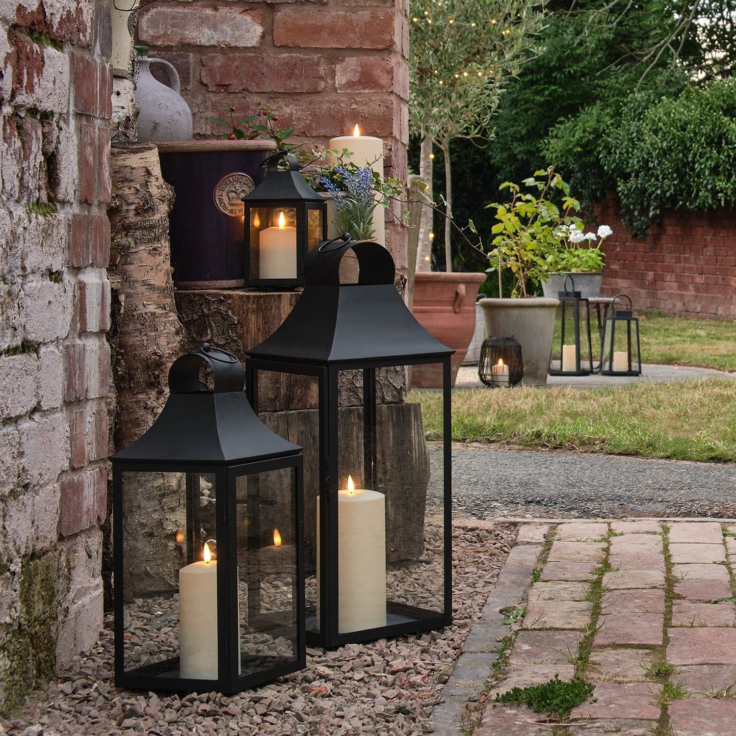 house with outdoor lanterns Illuminate Your Outdoor Space with Chic Lanterns