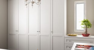 Hinged-door wardrobes pine painted white tall wardrobes along left wall, dressing table/drawers with mirror over,  betweenu2026 TUFHZKX