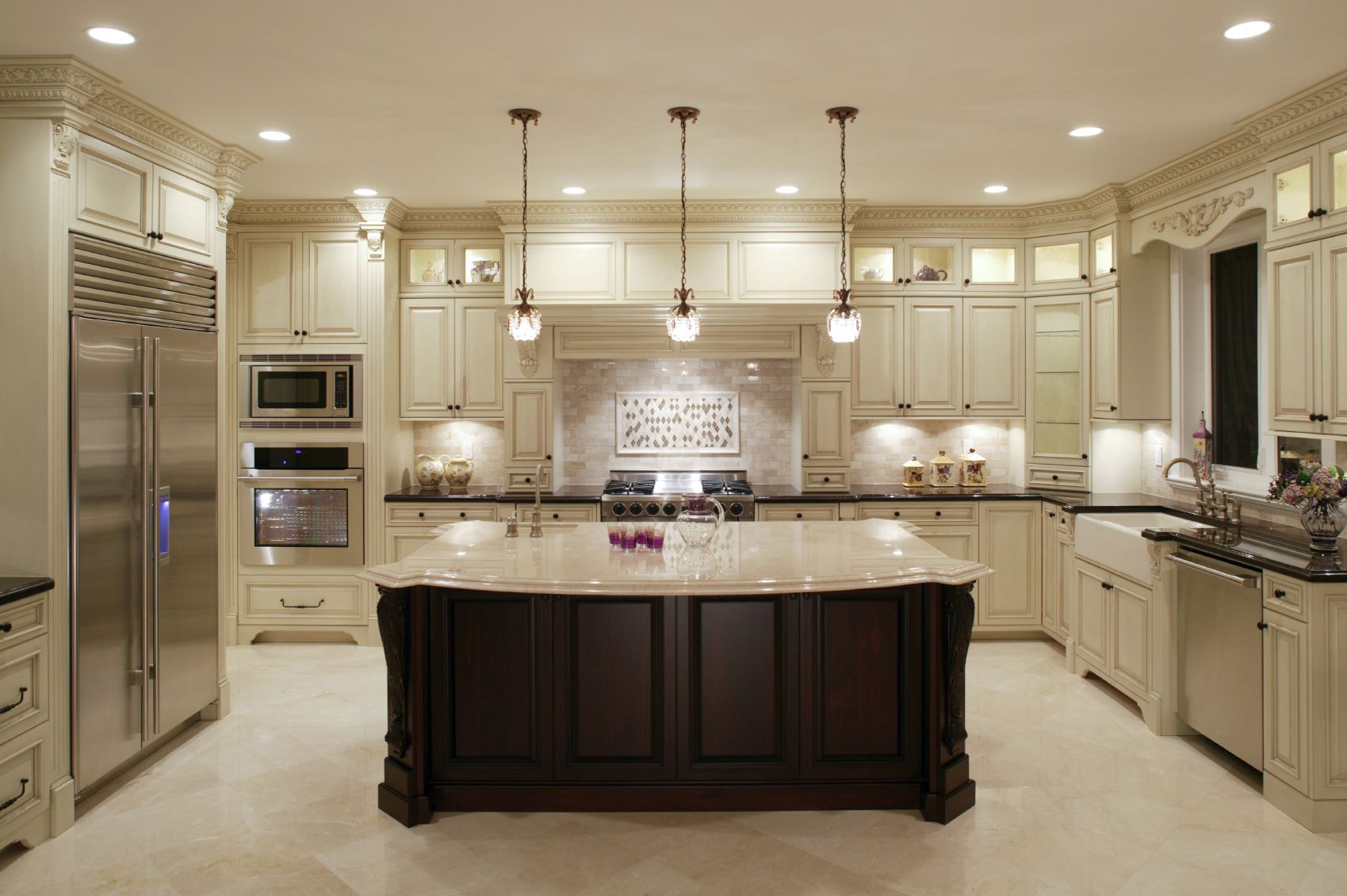 u shaped kitchen layout with island this u-shaped kitchen centers around a large dark wood island with classic AUWKKEH