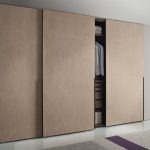 Space-saving storage furniture with flexible interior division: Wardrobes with sliding doors