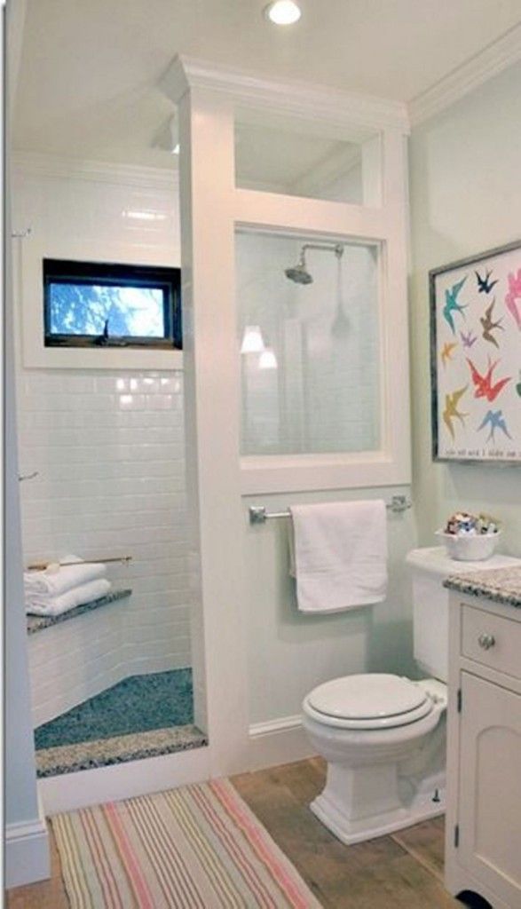 I like the colored tile on the floor and bench top with the white tile for  the rest of the shower. Doorless-Walk-In-Shower-Small-Bathroom