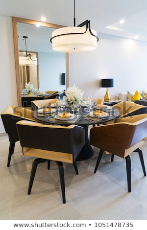 Dining table setting for dinner party at home. Cozy comfortable dining area  with stylish arrangement