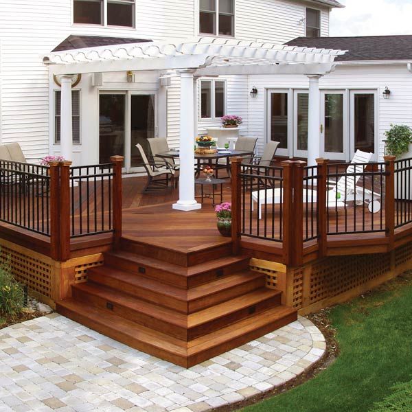 beautiful backyard deck with square design More