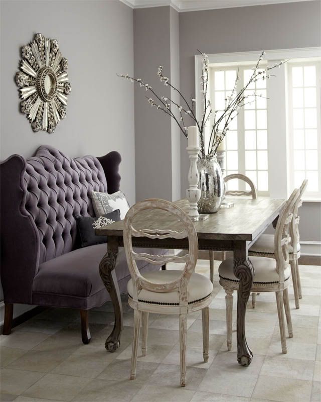 Great idea for a dining area to use a cushioned bench or loveseat against a  wall