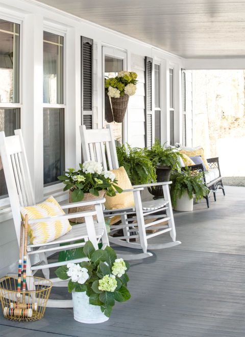 Really praying our retirement house will have a lovely porch to relax on.  Love the gray floor and white furniture