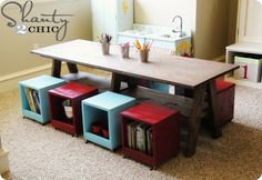 DIY kids activity table with rolling storage cubes. I love it. This site has