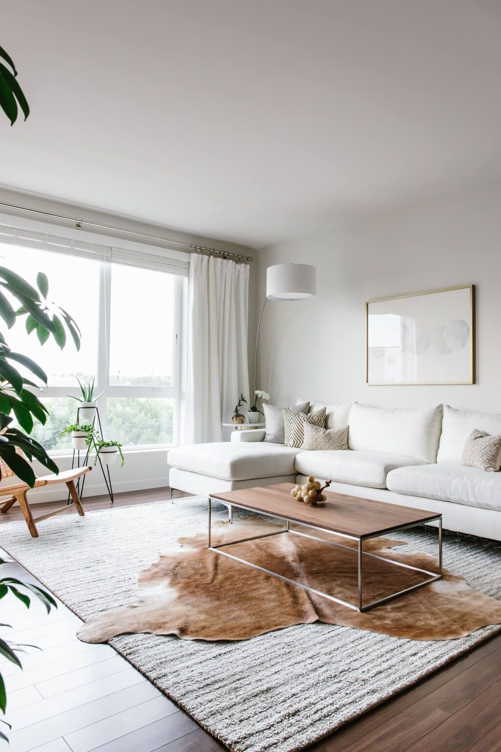 Take a tour of my modern and minimalist living room. My interior design  style is a blend of minimalism, mid-century modern, Scandinavian and SoCal  vibes.