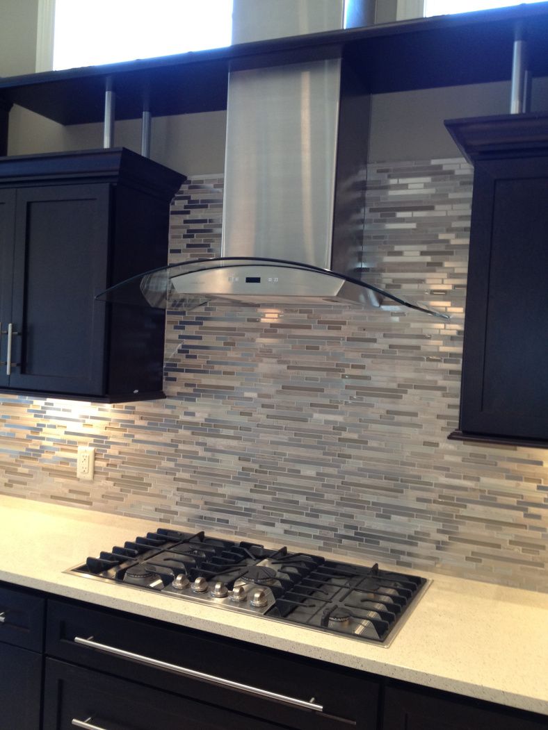 Glass and Stainless Steel Linear Backsplash---what great backsplash tile!  So modern! #RCI