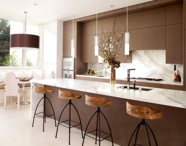 View in gallery Exquisite modern kitchen in white and brown with sleek  pendant lights above the kitchen island
