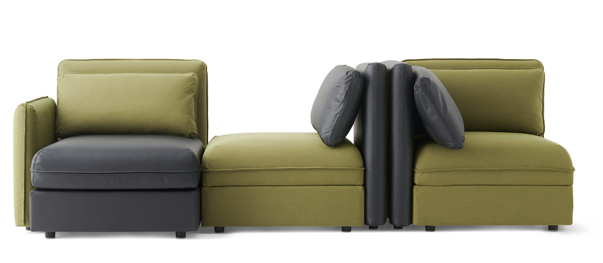 This combination of olive green and black VALLENTUNA modules can form a  dynamic sofa that sits