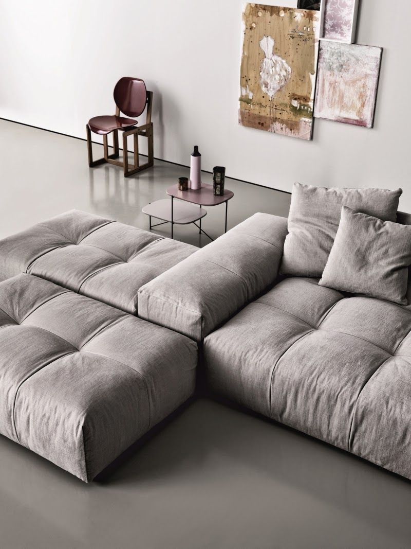 Modular sofa with back/arm big enough to sit on.