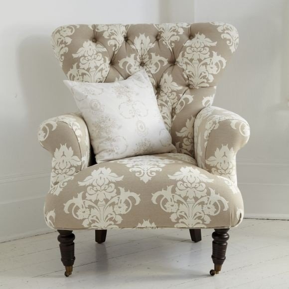 Button back cream patterned armchair