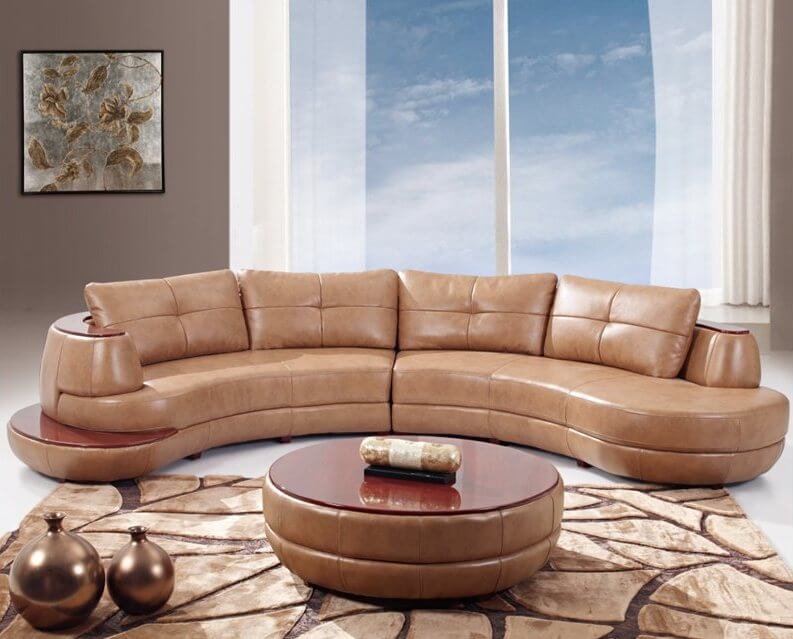 This two-piece curved leather sectional features a rounded edge shape with  rich wood plating on the top and small side platform.