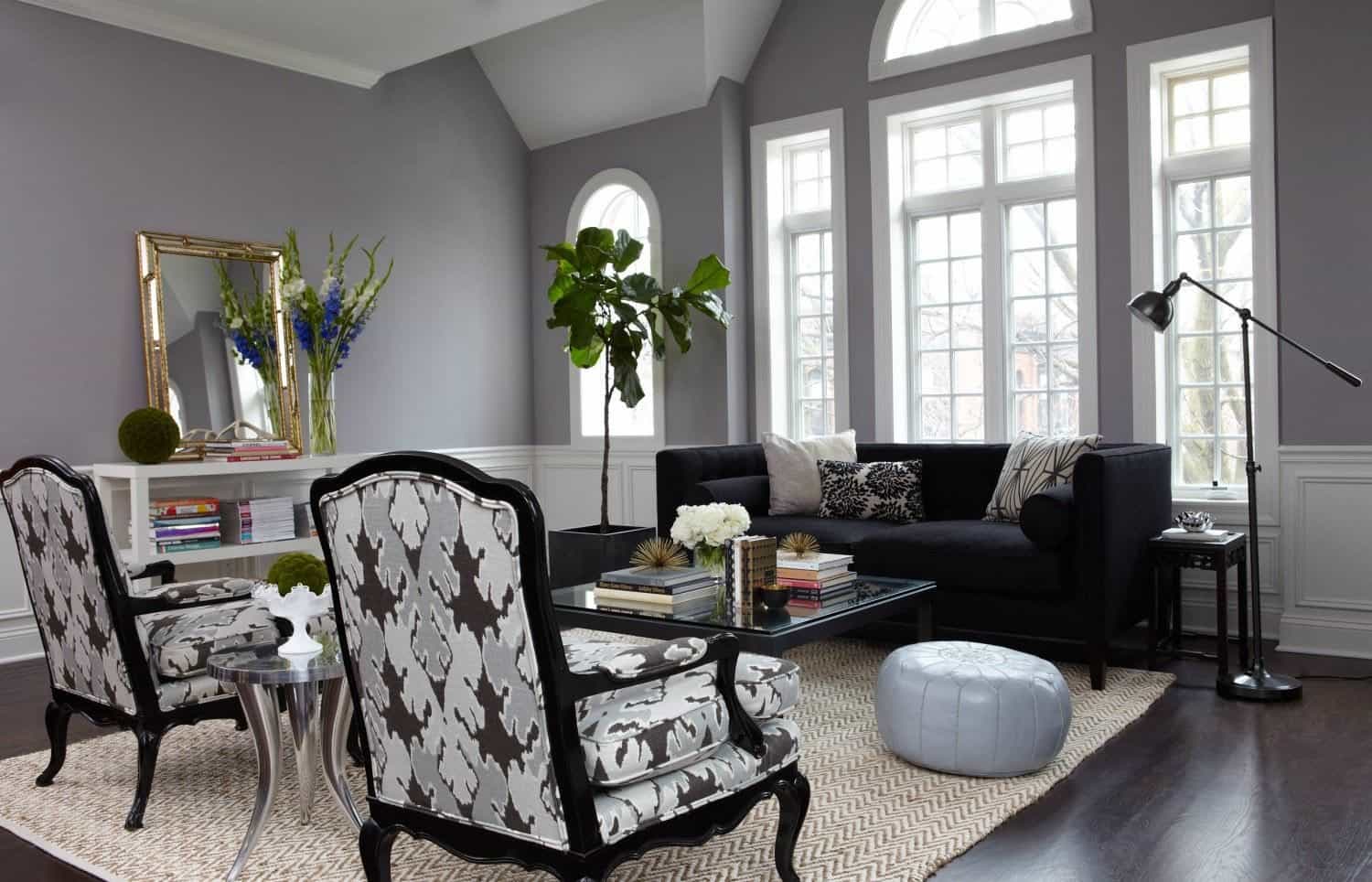 Gray Living Room With Black Sofa And Side Chairs