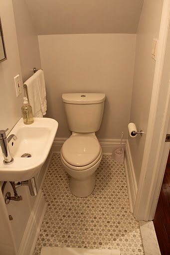 Small powder room - note the half size, but still stylish, sink