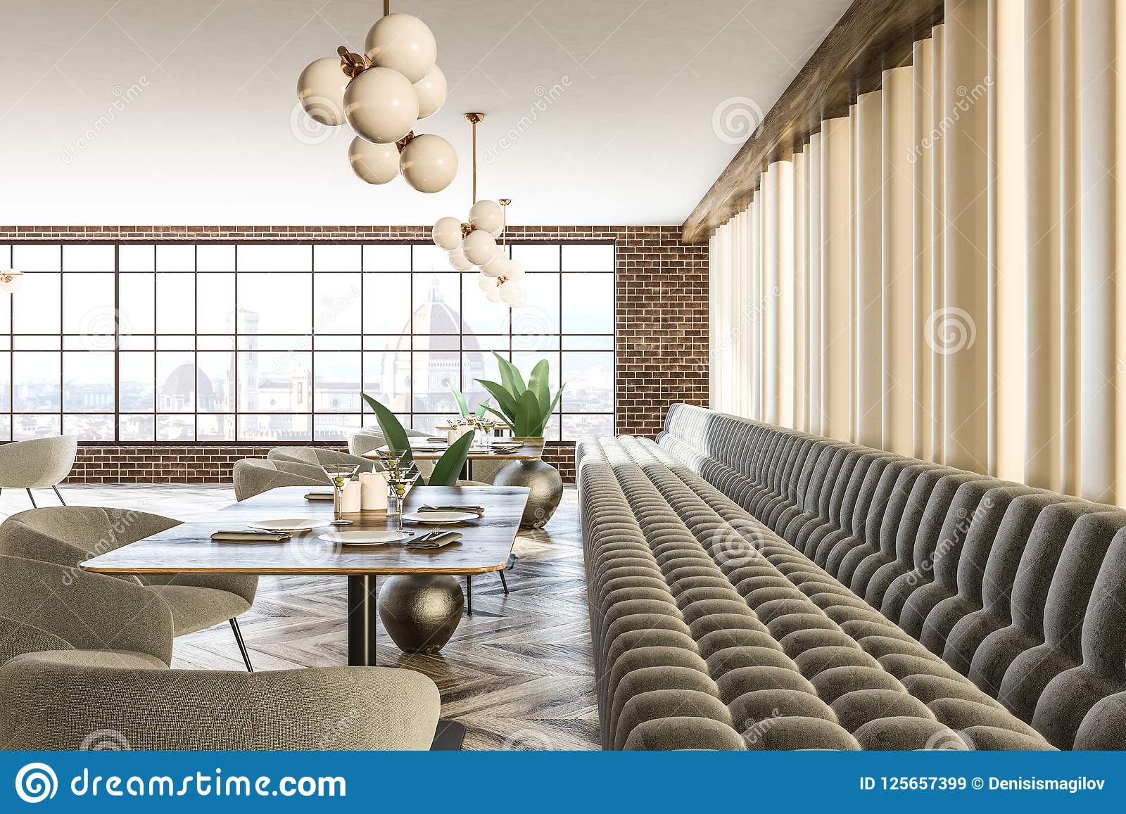 Brick wall gray sofas and armchairs cafeteria