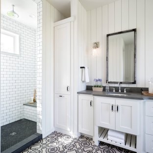 Inspiration for a country white tile and subway tile multicolored floor  bathroom remodel in Minneapolis with