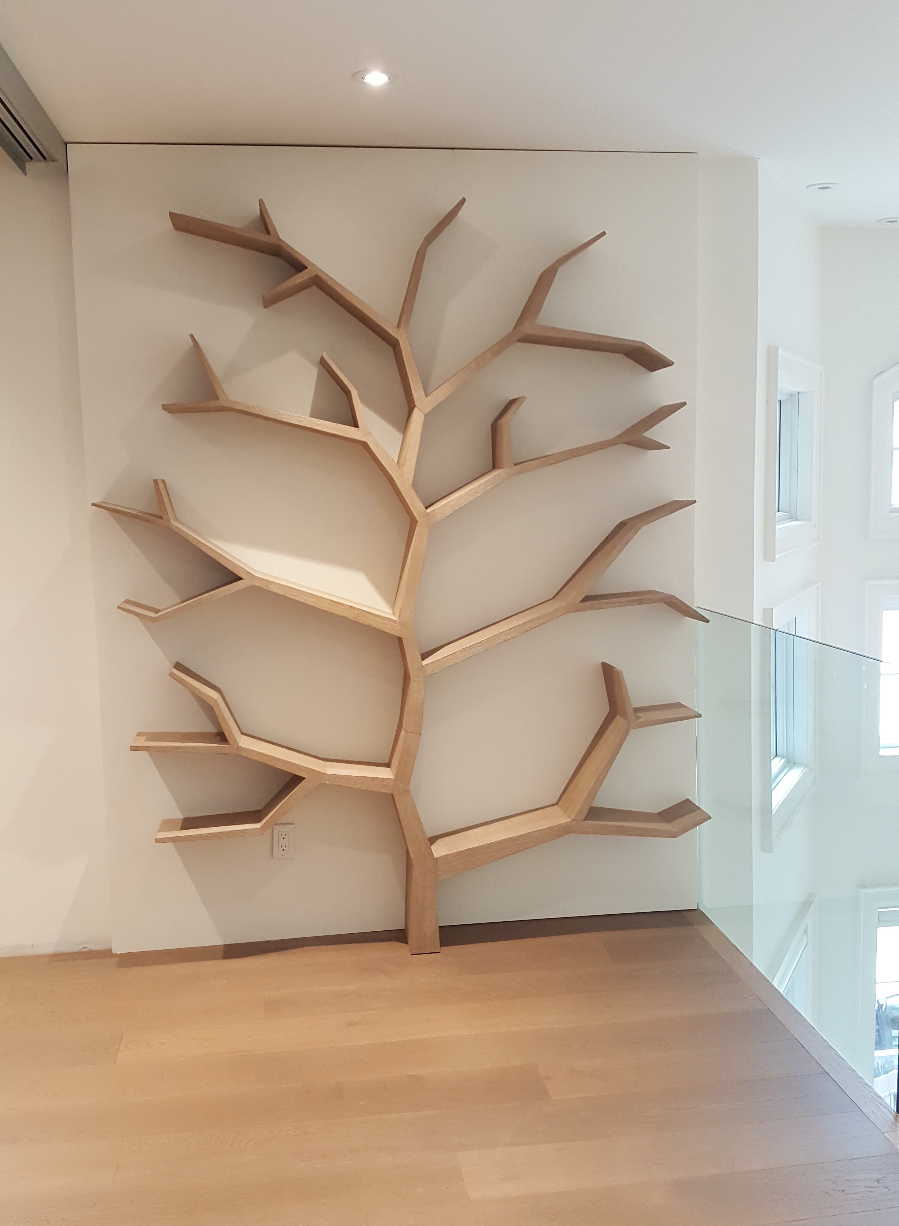 Tree Bookcase. A focal point for a new custom home that is essentially a  sculpture for