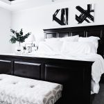 Black and white bedding for a classic bedroom interior