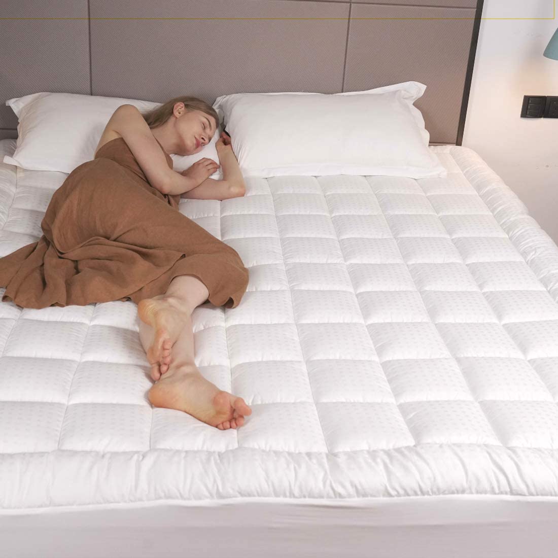 Enjoy little layers of luxury with pillow top mattress pad