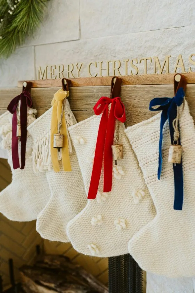 White yarn stockings on mantel