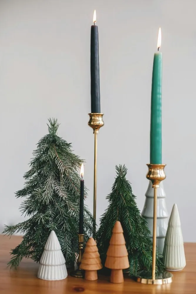 Scandinavian style wooden figurines on mantel