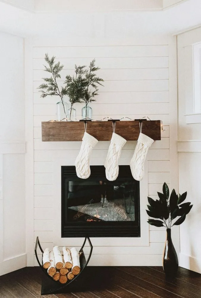 Clear vases with evergreen branches